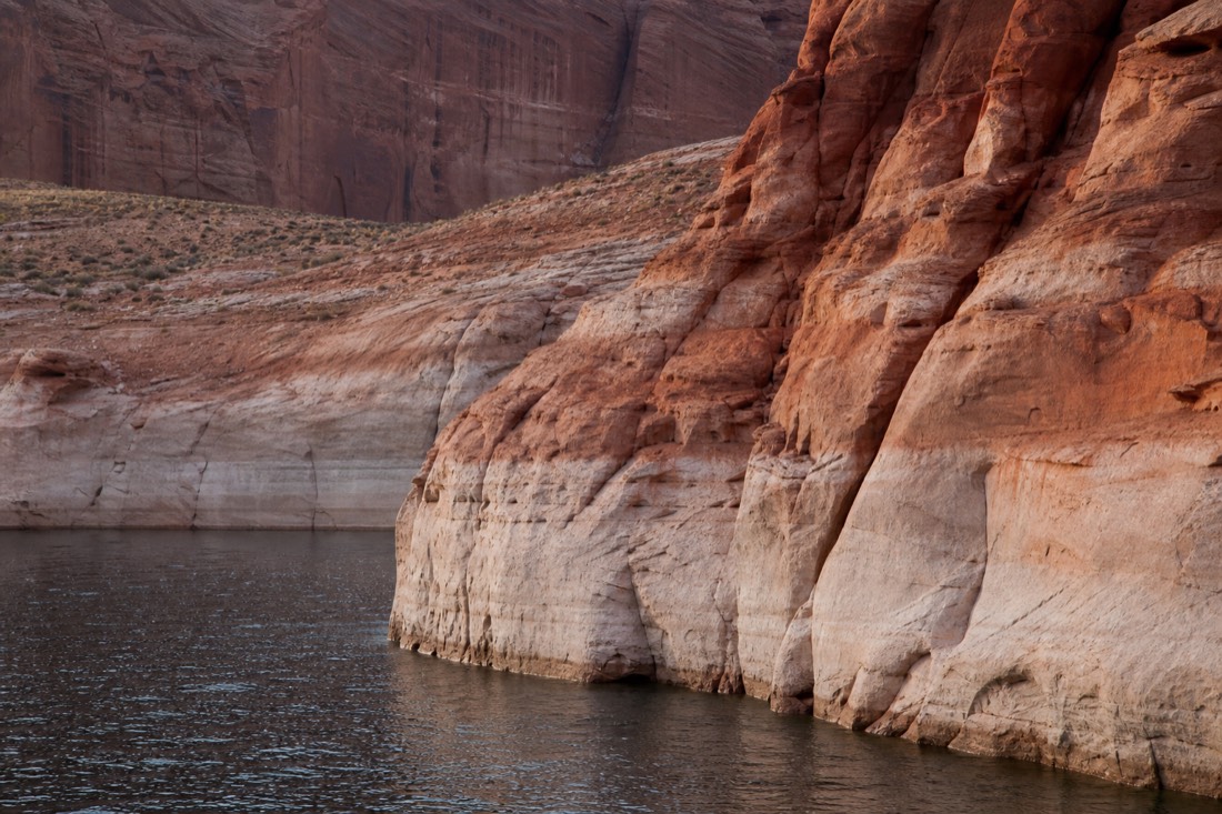 Bathtub ring of light rock showing past water levels on Lake Powell canyon walls
