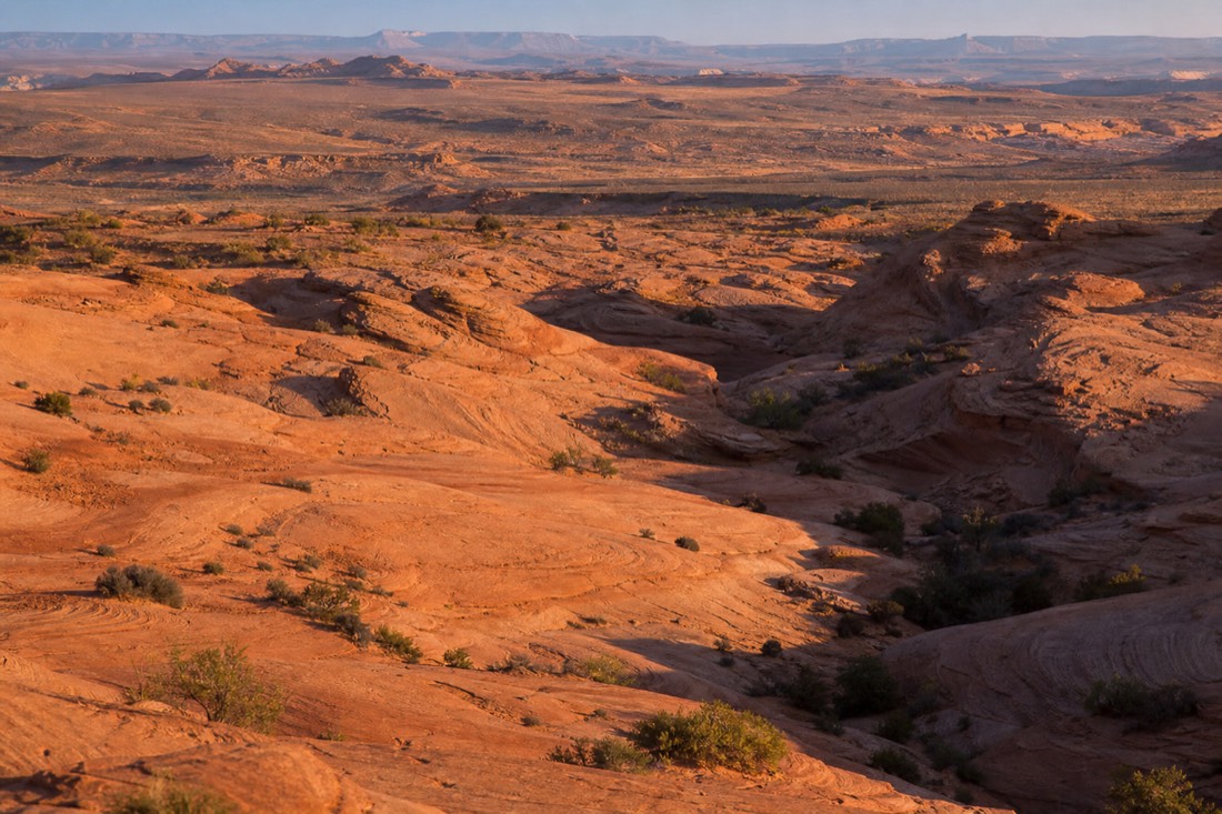Wide desert view of Antelope Wash country near Page with multiple drainage lines in the sandstone