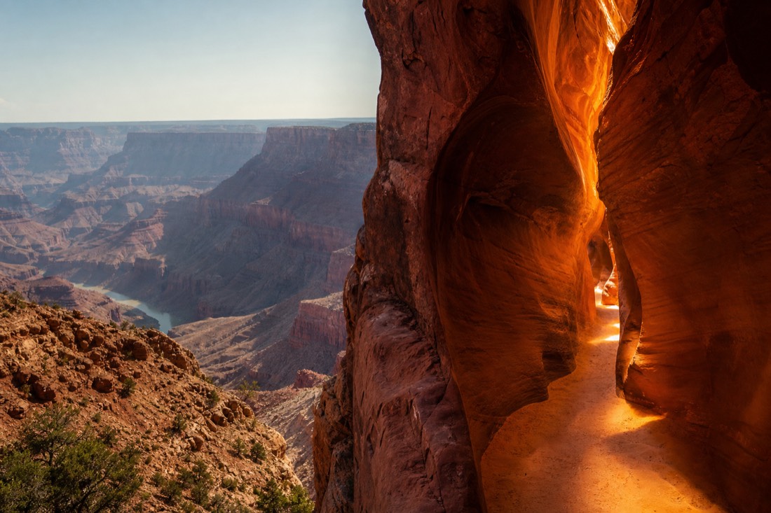 Contrast of a vast canyon valley landscape and a narrow glowing slot canyon corridor