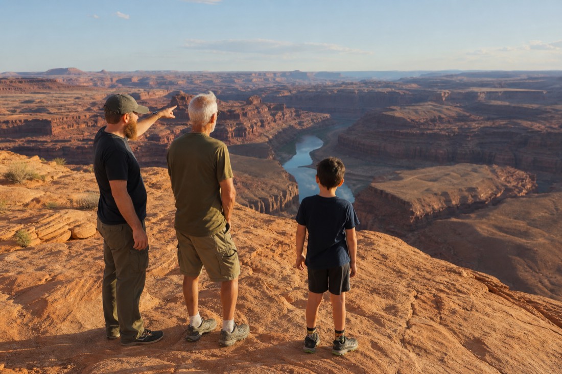 Three generations of a family at a canyon overlook near Page Arizona deciding on a route