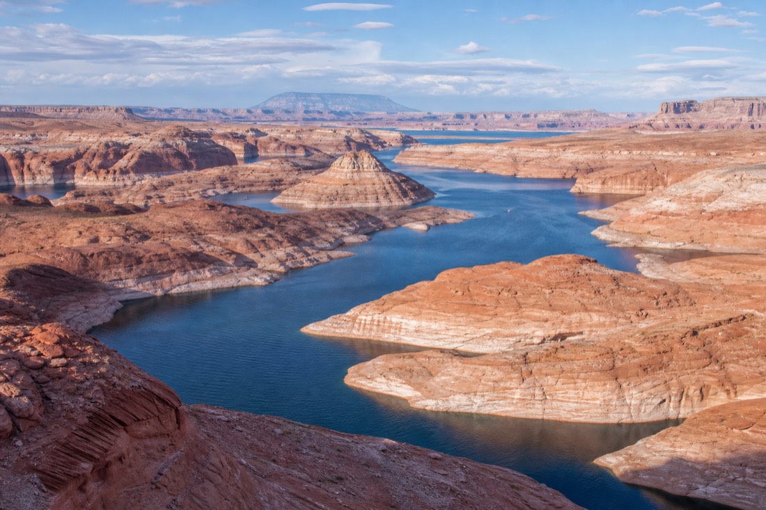 Overview of Lake Powell blue water winding through red sandstone canyons